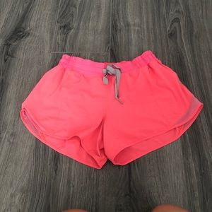 Neon pink lululemon shorts